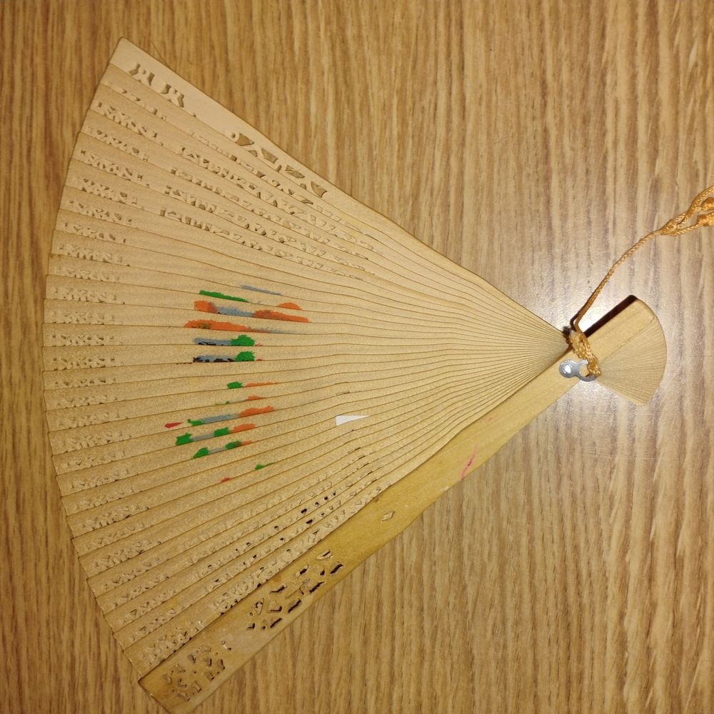 Artistic Wooden Fan with Painted Details